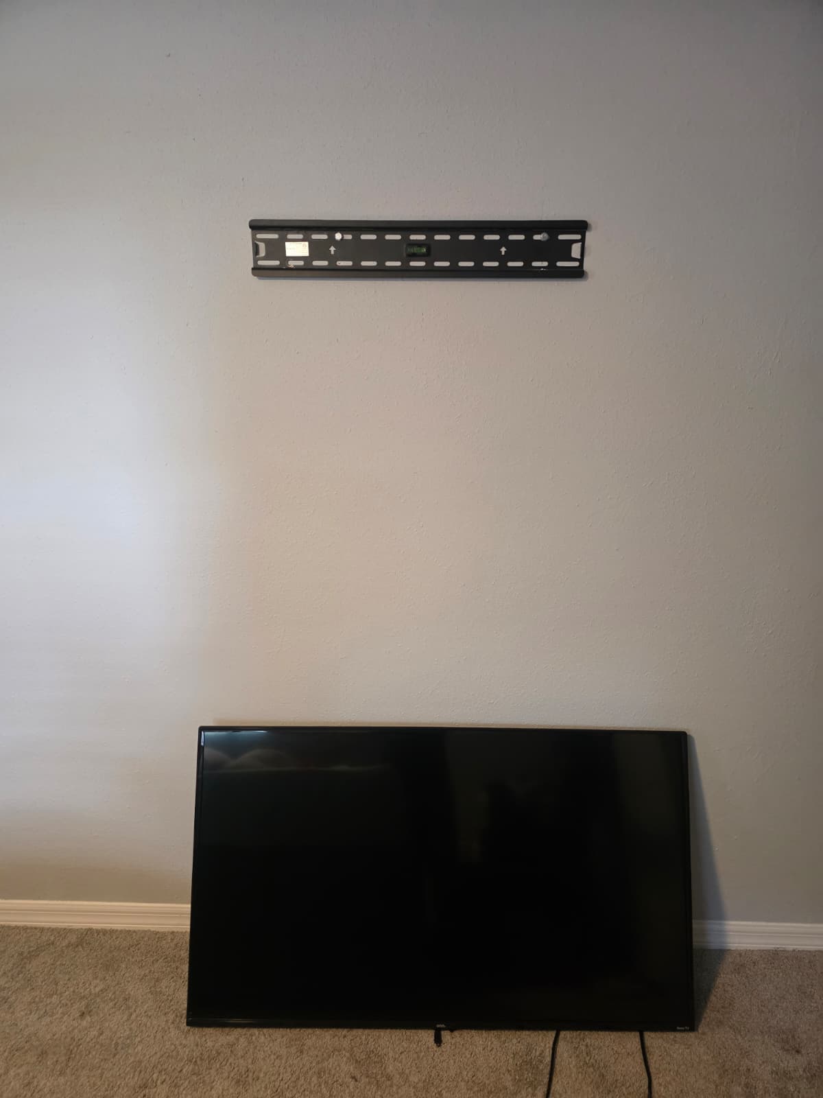 TV wall mount bracket installation Tampa FL before photo